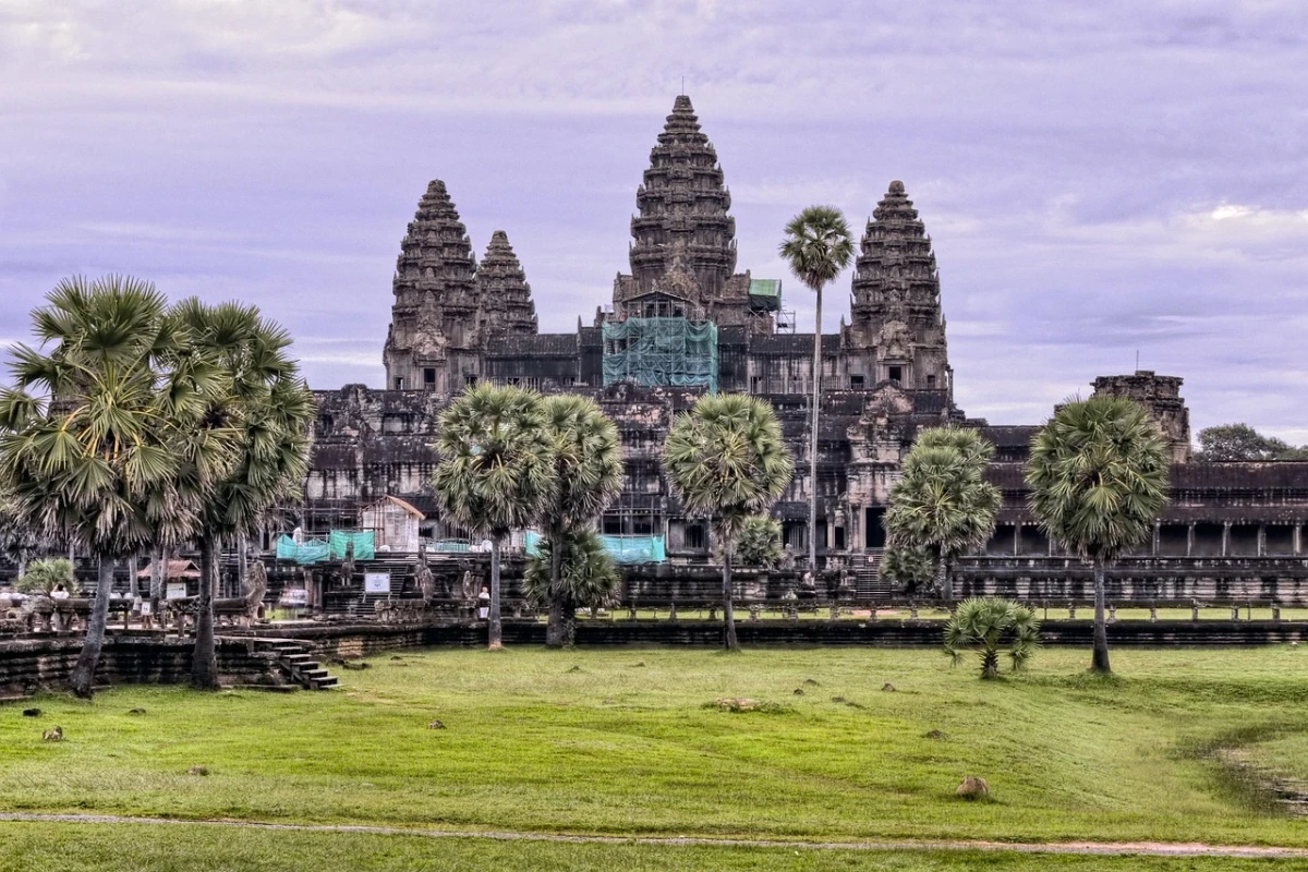 Angkor Wat Temples, Cambodia - Ancient Khmer Architecture Angkor Wat Temples in Cambodia showcasing ancient Khmer architecture and lush surroundings