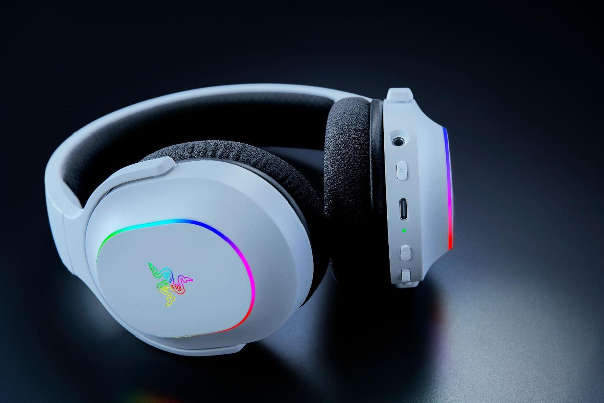 A white headphones with a colorful lightDescription automatically generated