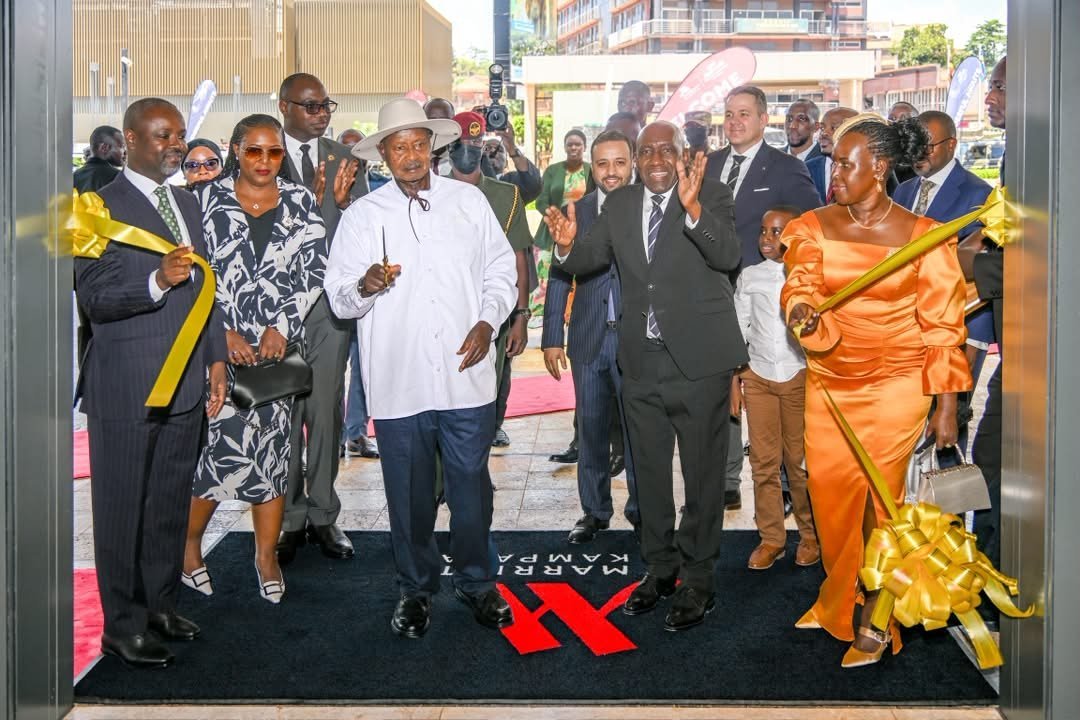 President Yoweri Museveni third from left, at the commissioning the bland new Kampala Marriott Hotel and Marriott Executive Apartments Kampala.