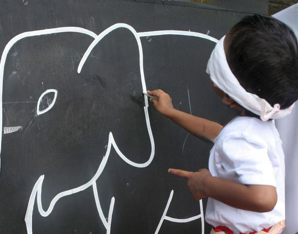 Elephant face for eye placing competition