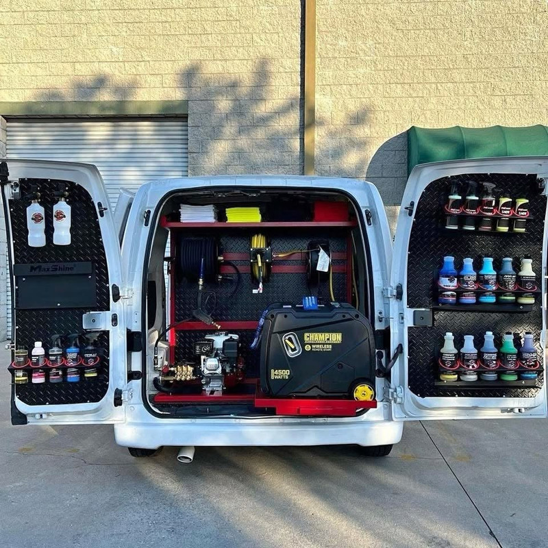 AquaJet Mobile Detailer at work on a luxury car