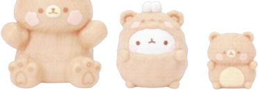 Bottom of a bear toy, alongside molang in a bear suit and another but smaller bear toy