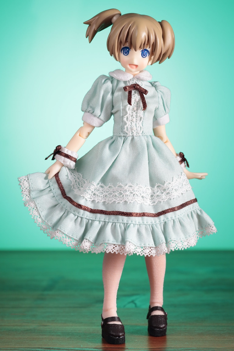 A front view of “Custom Lily” Type-C in light brown wearing a 1/12 Alice Dress Set for Dreaming Girl in mint green