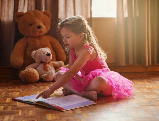 learning-read-is-learning-see-shot-little-girl-reading-storybook-590464-51156.jpg