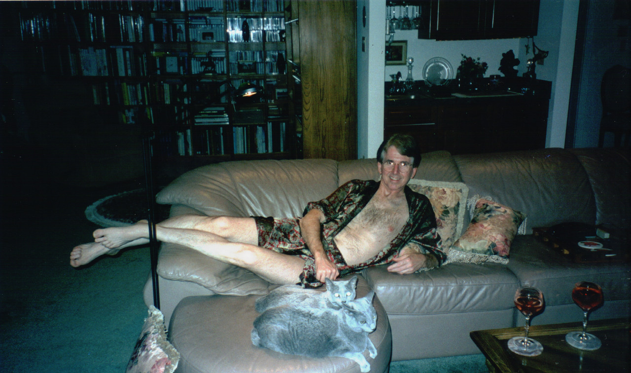 Lying on the sofa wearing a robe