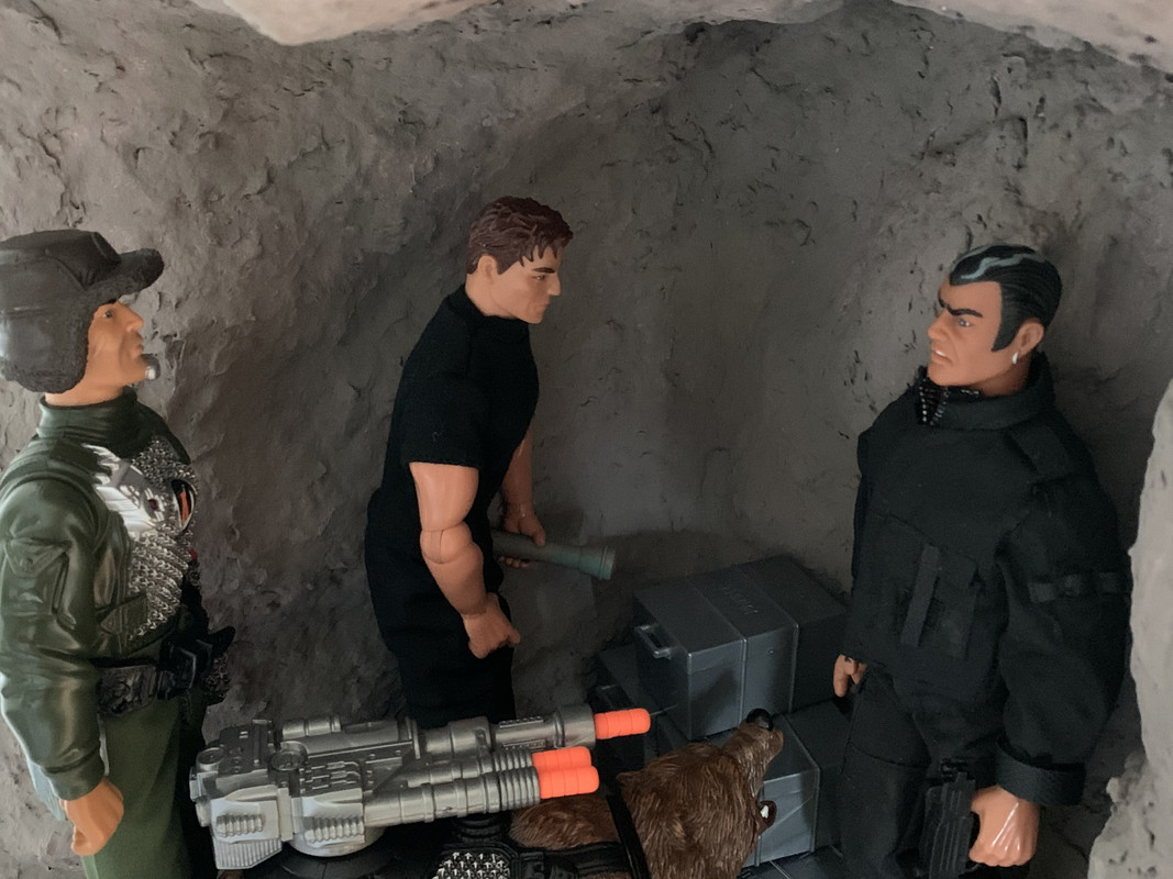 Smugglers caught checking their stolen loot by Action Man and his grizzly bear. F993-CA5-F-C471-48-A4-A1-C8-D8-BE899-A1652