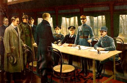 Pintura que representa a la firma del armisticio en el vagón. De izquierda a derecha están el Almirante alemán Ernst Vanselow, el Conde alemán Alfred von Oberndorff del Ministerio de Relaciones Exteriores, el General alemán von Winterfeldt Detlof, con casco, el Oficial Naval británico Capitán Jack Marriott, y de pie delante de la mesa, Matthias Erzberger, jefe de la delegación alemana. Detrás de la mesa están los dos oficiales de la marina británica, el Contralmirante George Hope, Primer Lord del Mar almirante sir Rosslyn Wemyss, y los representantes de Francia, el Mariscal Ferdinand Foch, de pie, y el General Maxime Weygand