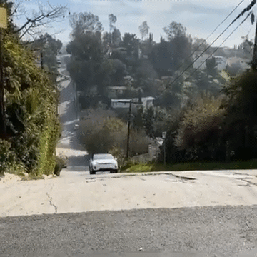 Tesla-X-jump-on-hill-1.gif