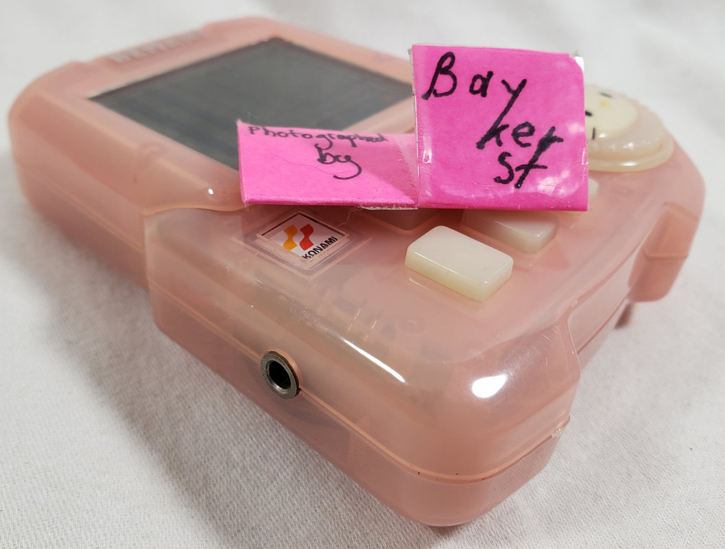 Hello Kitty Bemani Beat Mania Handheld keychain LCD Game face