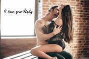 sensual-kiss-side-view-of-beautiful-young-loving-couple-kissing-and-hugging-while-sitting-on-wood-pa
