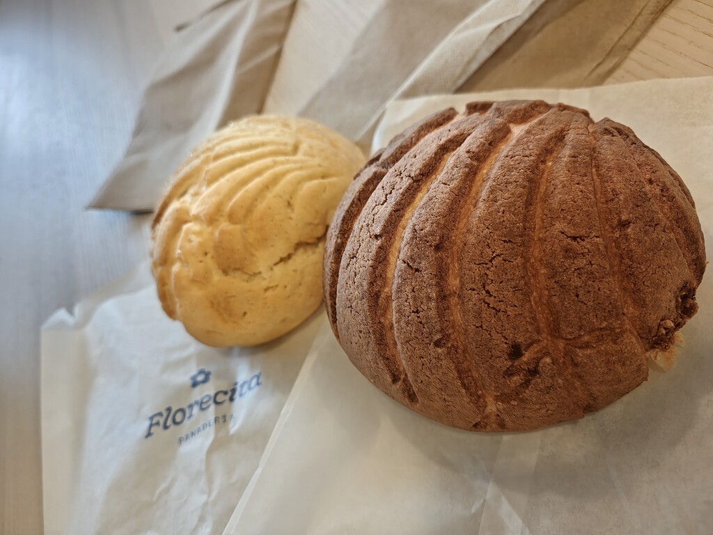 two pan dulce on a bag