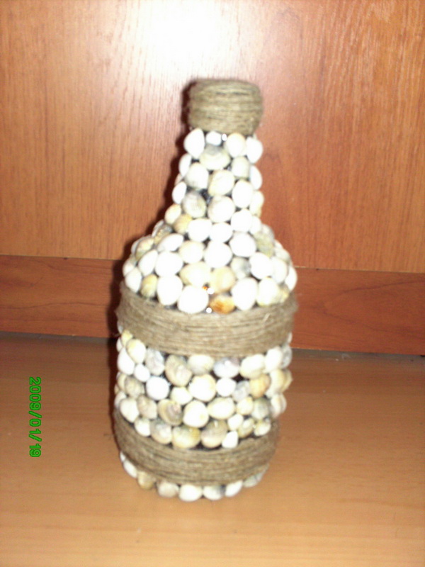 ваза из ракушек и веревки