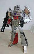 MP-29-Megatron-In-Hand-images-01
