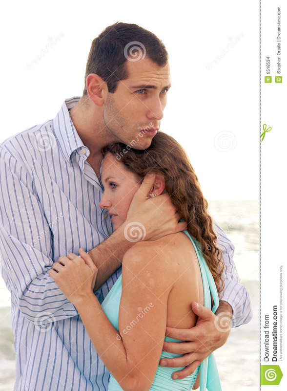 man-holding-woman-close-comforting-her-9518534.jpg