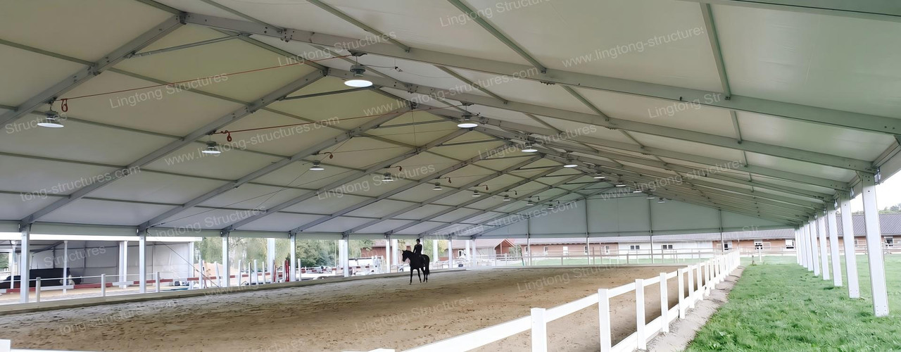 Large span aluminum equestrian tent with clear interior for horse training and events