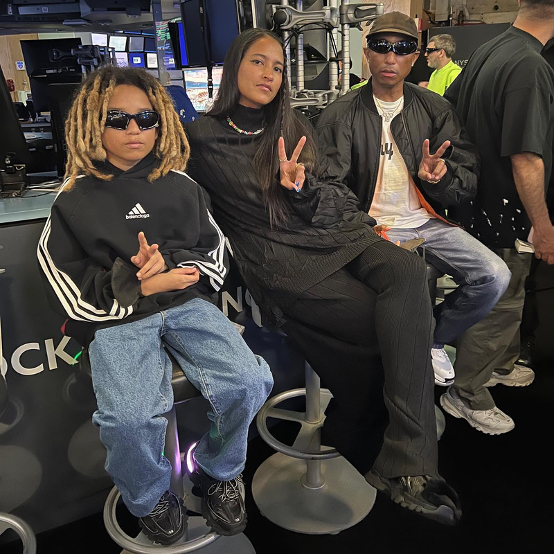 PHARRELL WILLIAMS, WIFE AND SON POSE IT UP DURING PFW 2023