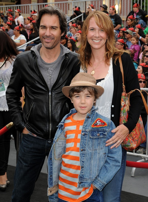 Eric McCormack and Janet Leigh Holden with son