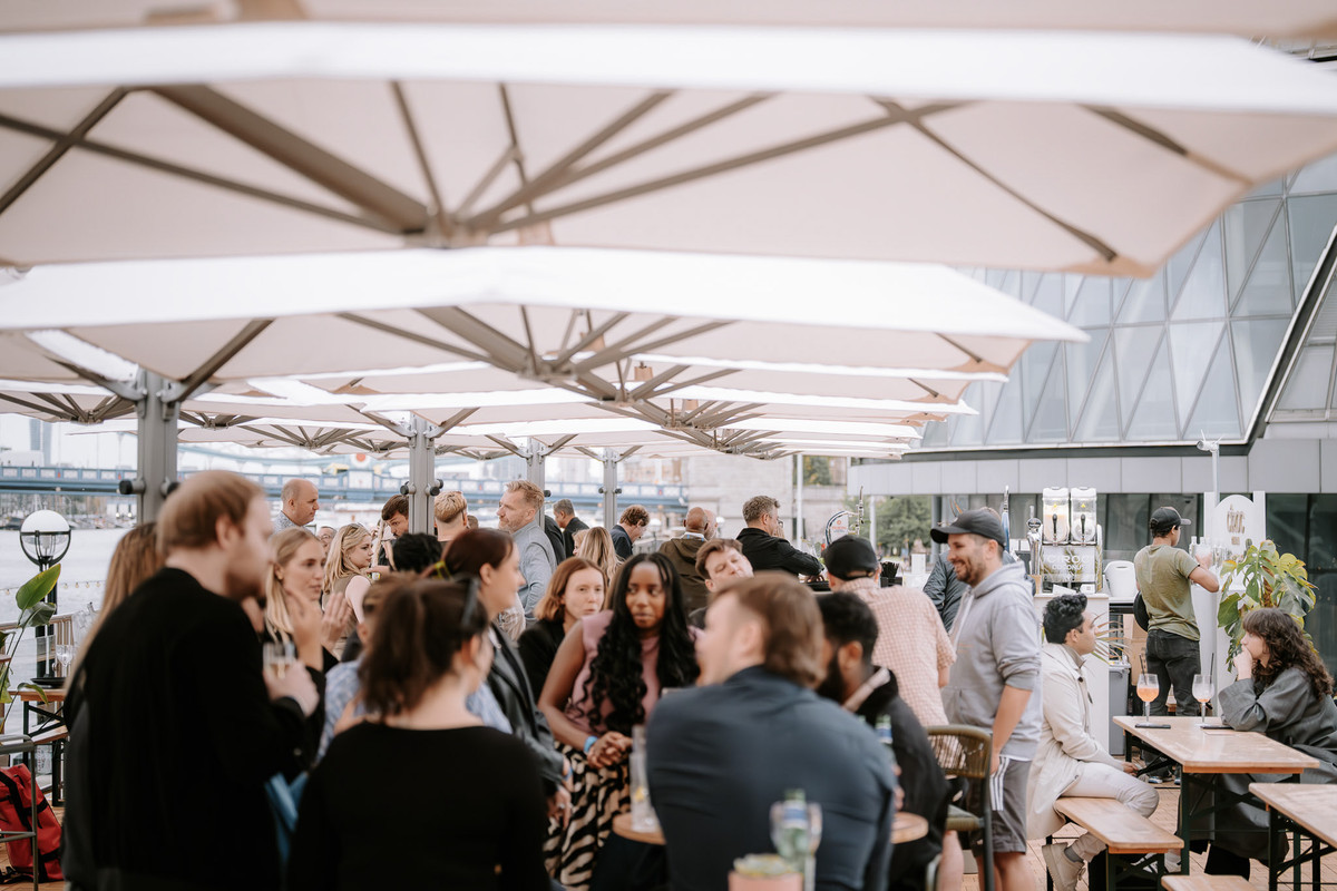 Guests enjoying the event on the Glasshouse Terrace