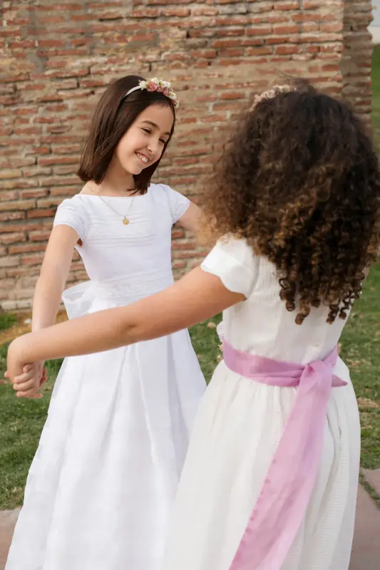 Vestido para daminha rosa claro com laço