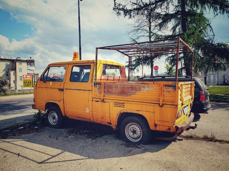 old-yellow-rusty-truck-car-volkswagen-transporter-t-double-cabin-parked-old-newtimer-yellow-rusty-ab