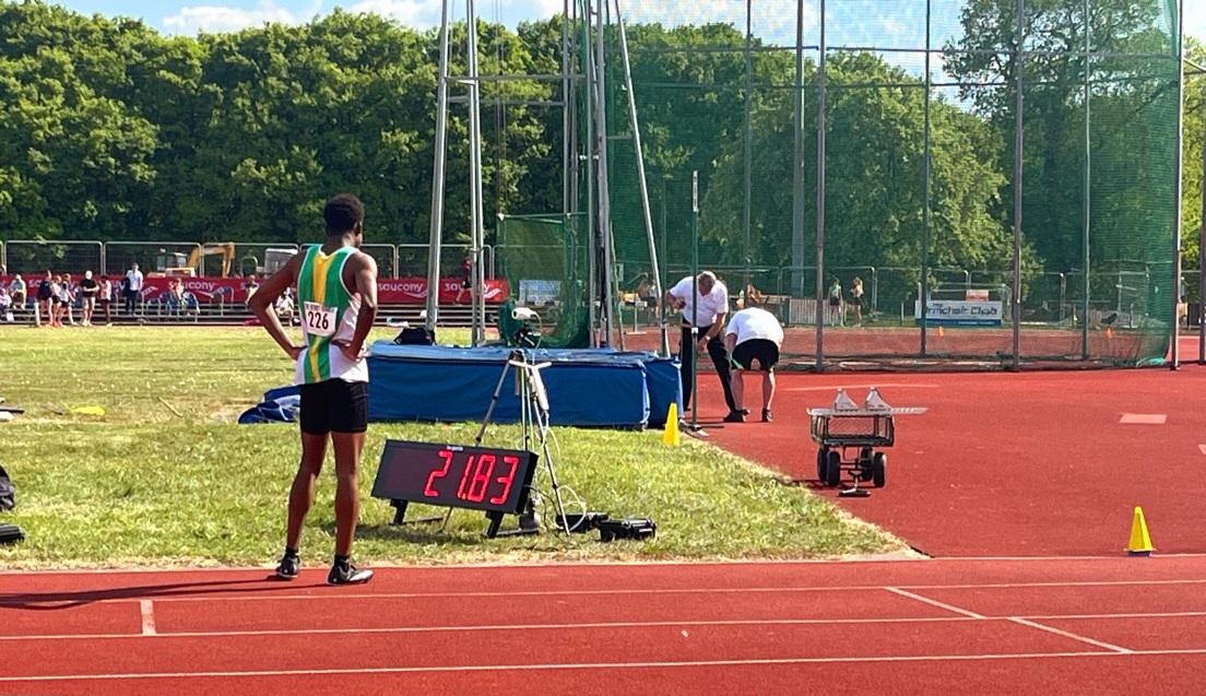 Gabriel Oguagwu marvelling at his new 200m PB of 21.81s as it displays on the electronic clock