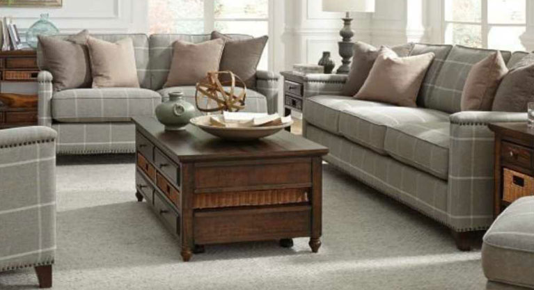 Winslow embodies the timelessness of plaid and clean design. This traditionally inspired loose seat and back upholstery collection gets a youthful update with a taupe matched plaid upholstery and a thin squared off, extended arm. Just the right amount of antique brass nail head trim to confirm classic pedigree outlines the arm while shaped block feet keep the look fresh and current.