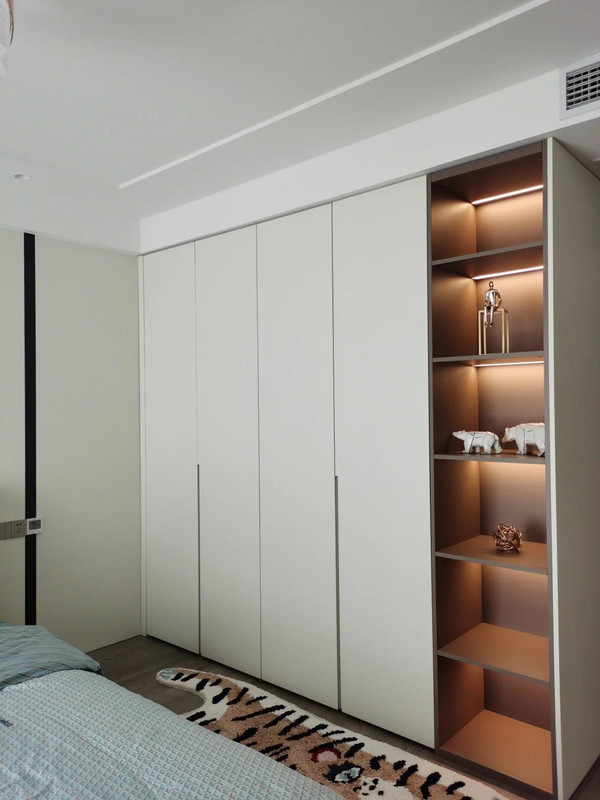Modular wardrobe units allowing flexible arrangements and personalized storage options.