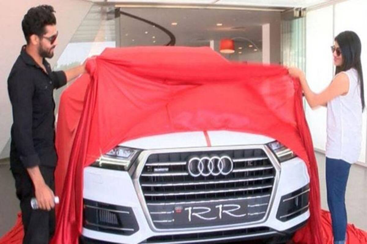 Jadeja taking delivery of his car