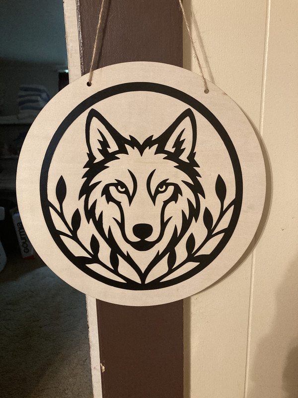 handcrafted natural wolf sign