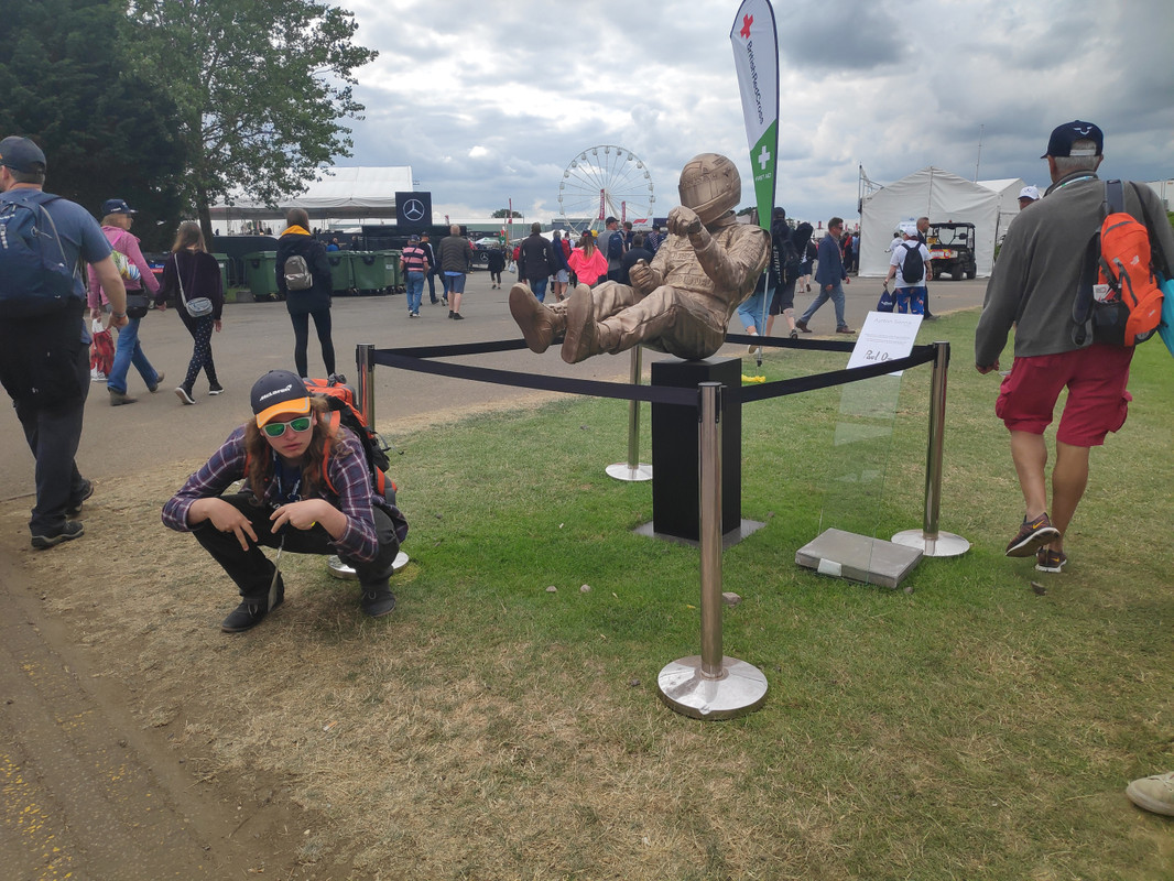 Chris posing in front of the Senna statue