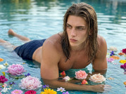 Man-lying-in-swimming-pool-202605111957