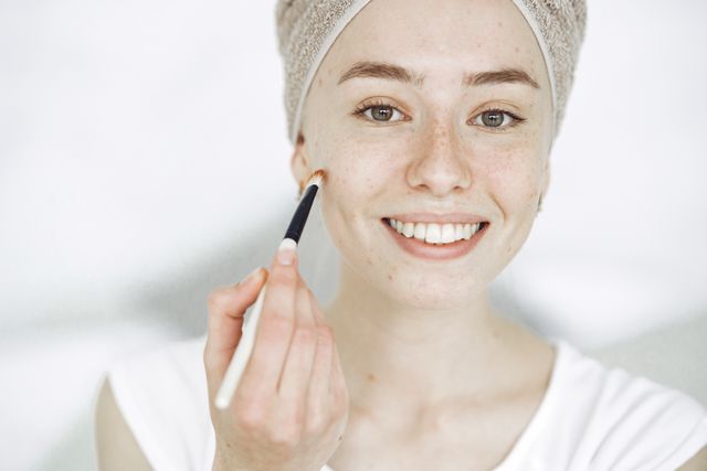 a woman preparing her skin before makeup so her foundation can sit on skin smoothly 
