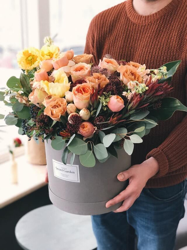 women holding flower basket