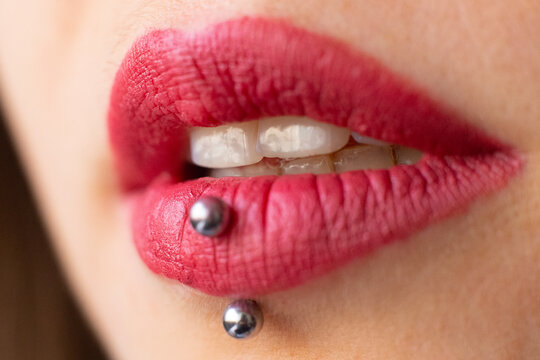 Exploring Unique Lip Piercings With Rings And Hoops