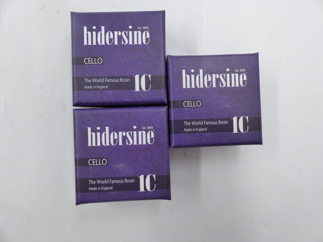 LOT OF THREE HIDERSINE 1C CELLO ROSIN LARGE CAKE IN CLOTH