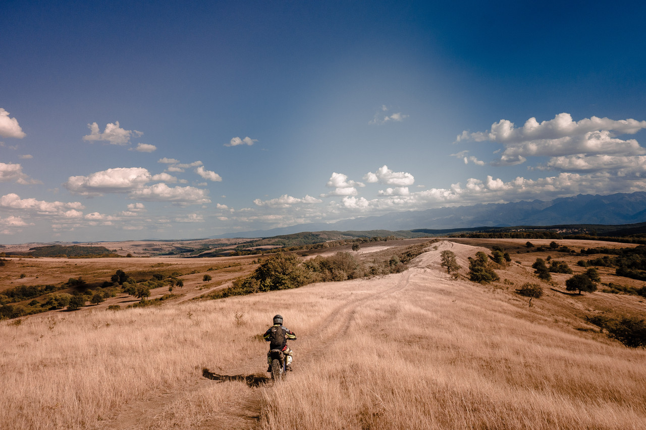 Enduro riding across open hills