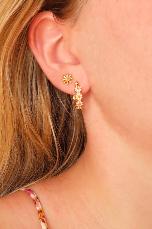 Cheerful hoops with pink daisies! Pair these earrings with our gold Daisy  studs.