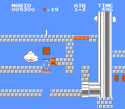 Mario hits a hidden block after jumping off the edge of a springboard and goes into the structure in Air 1-3.