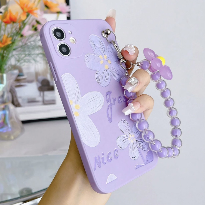 Foto de Funda violeta con diseño de flores.