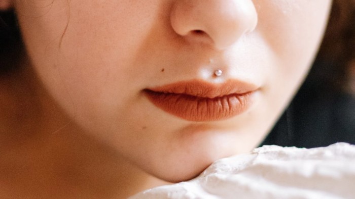 Exploring Unique Lip Piercings With Rings And Hoops