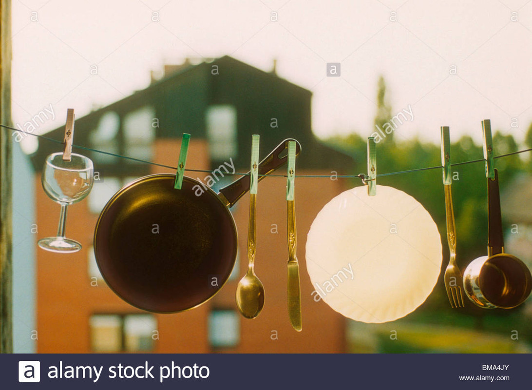 dishes-on-a-clothes-line-BMA4JY