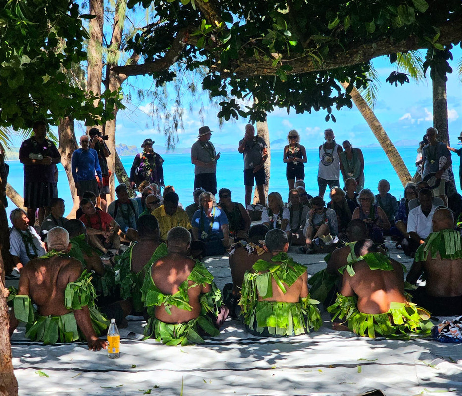 Tourists-accorded-a-traditional-fijian-welcome-ceremony-upon-their-arrival-into-Yasawai-rara-village