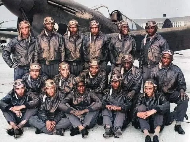 USAAF-Tuskegee-Airmen-in-front-of-their-P-40.webp