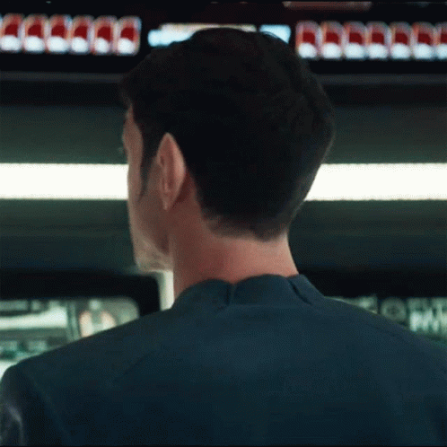 a gif of Spock, played by Ethan Peck, turning towards the camera