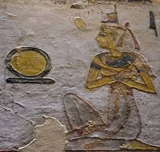 Horus holding the Shen Ring