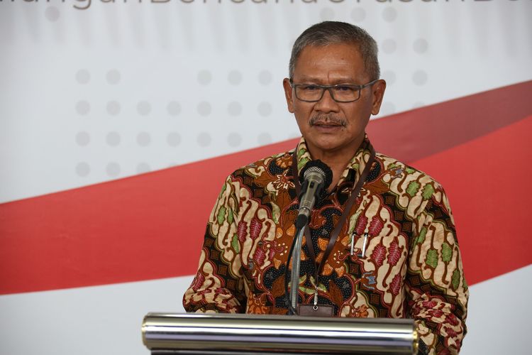 Juru bicara pemerintah untuk penanganan covid-19 Achmad Yurianto saat memberikan keterangan pers di Graha BNPB, Jumat (27/3/2020).