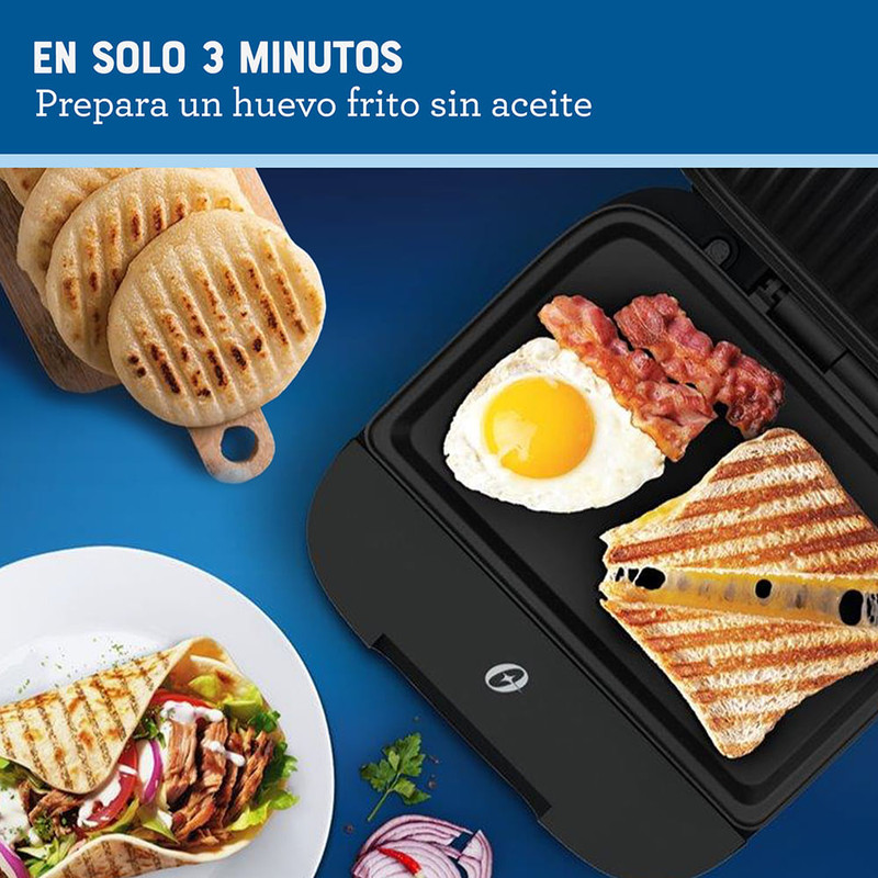 Detalle interior y plato hondo de la sandwichera Oster