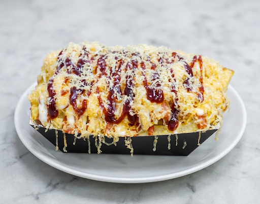 Patatas con Queso Cheddar Con Salsa a elegir