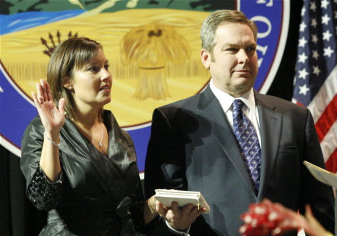 Mary Taylor taking the oath with her husband Don Taylor