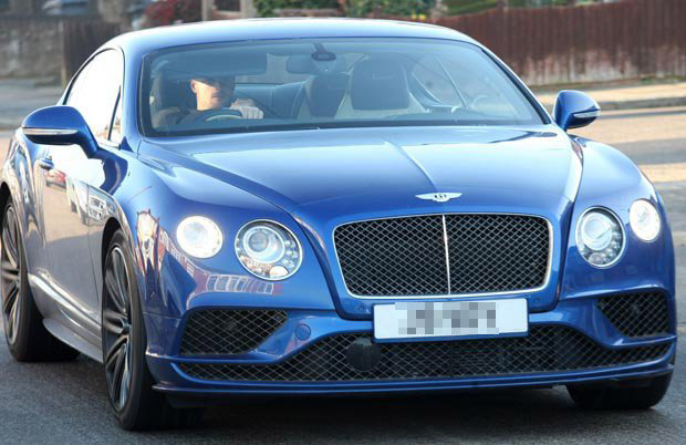 Jamie driving his Bentley